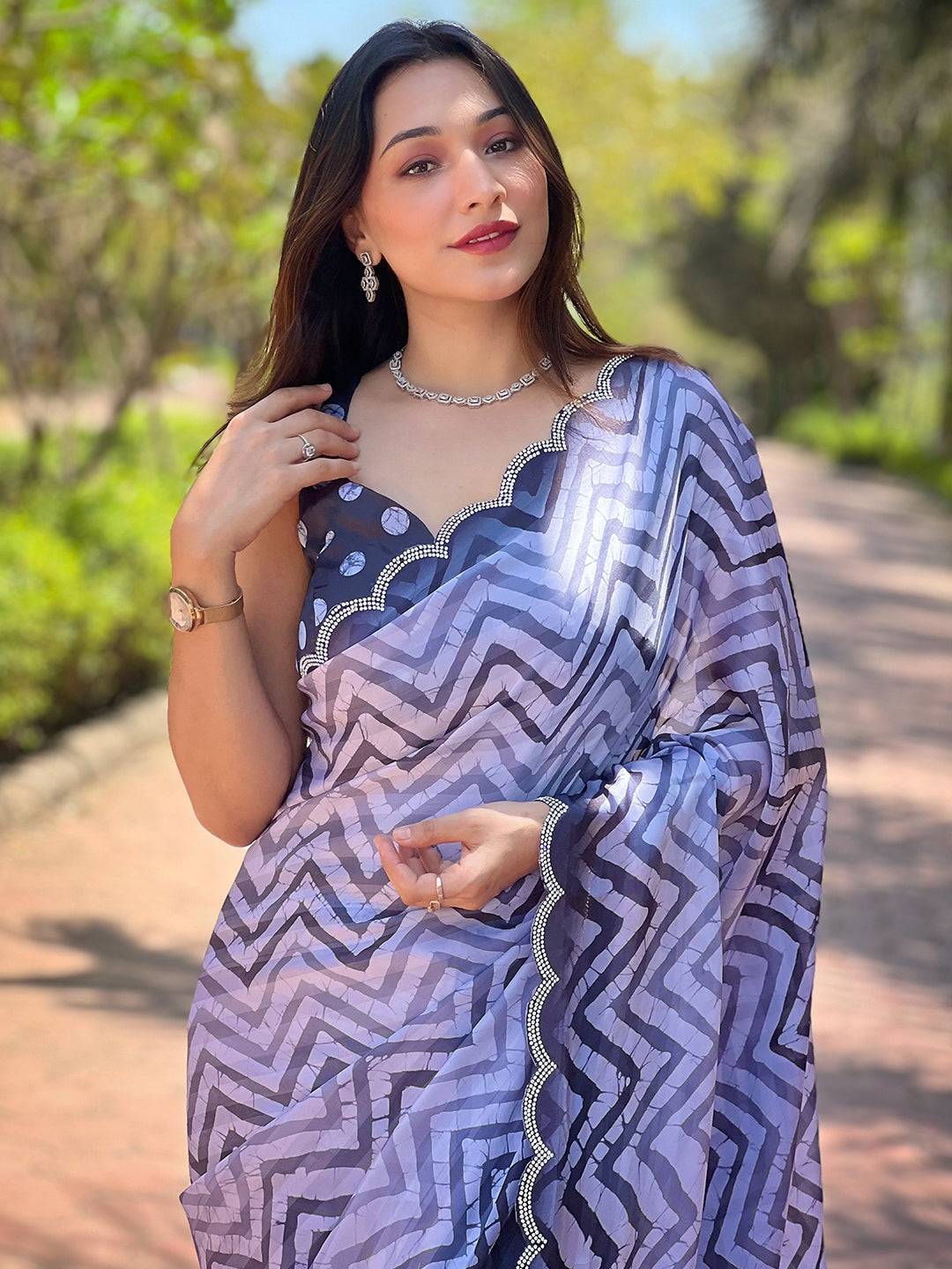 Beautiful Leheriya And Striped Print Saree