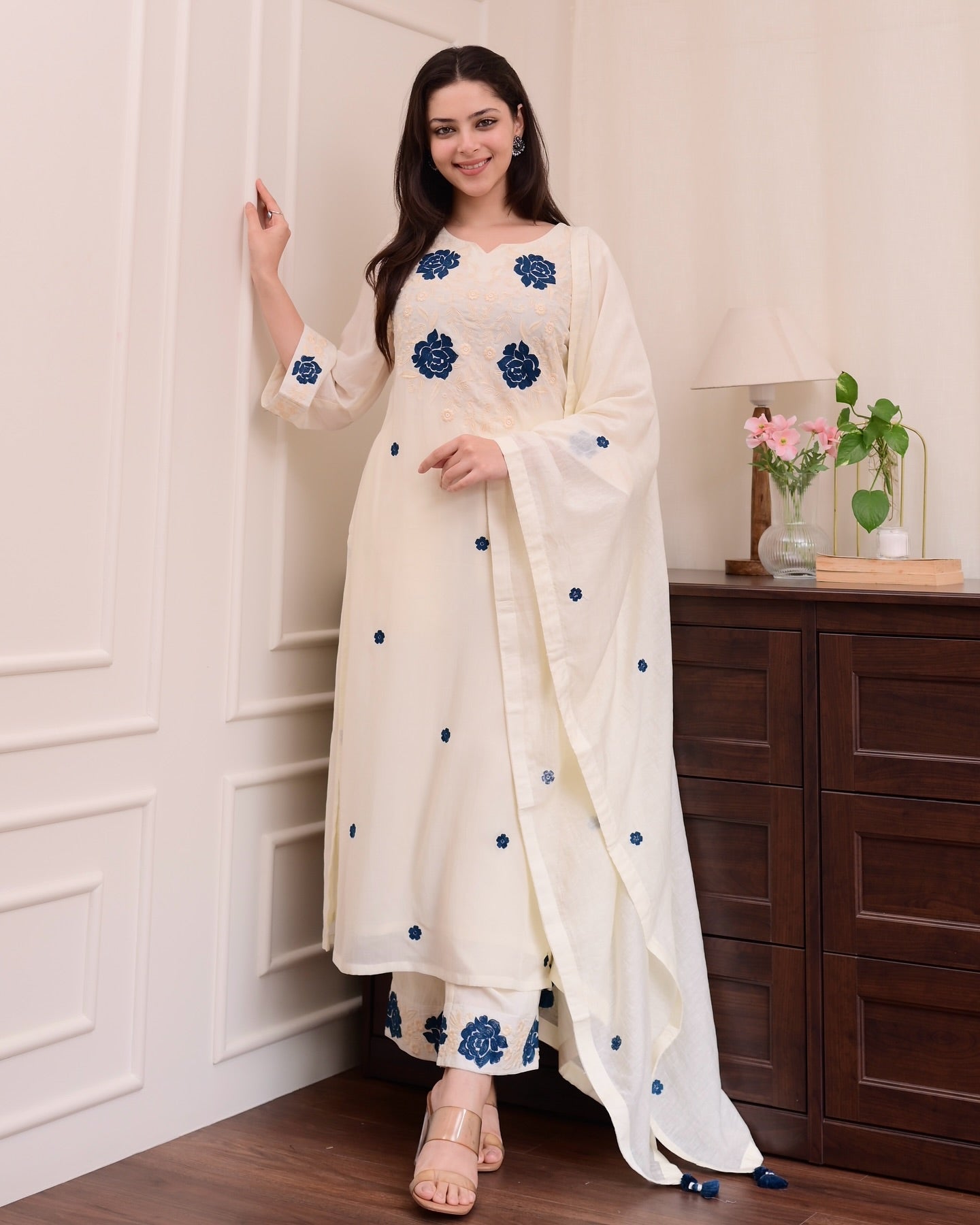 Graceful White Kurta Set with Blue Floral Accents