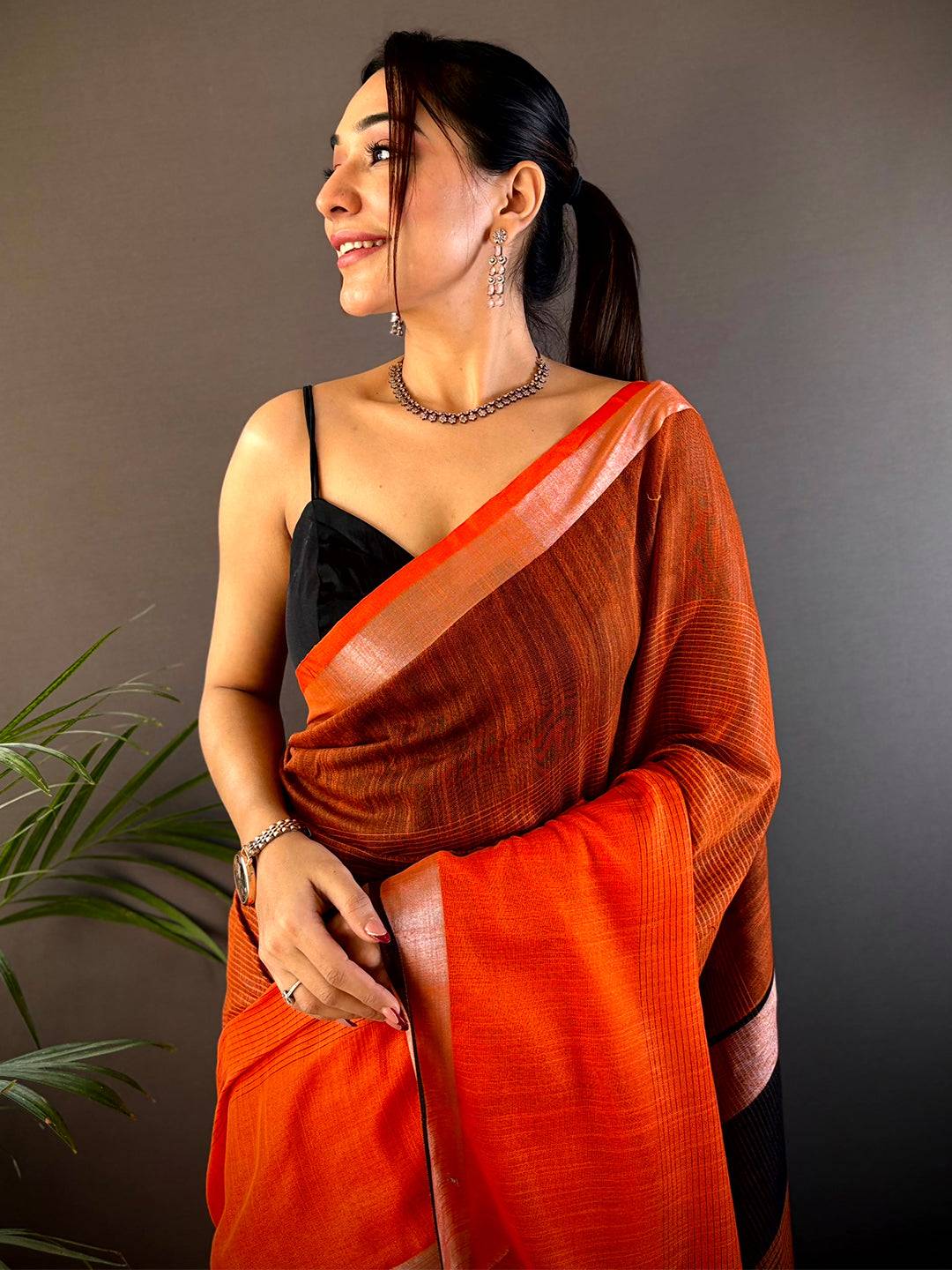 Orange Stylish Linen Saree With Zari Border