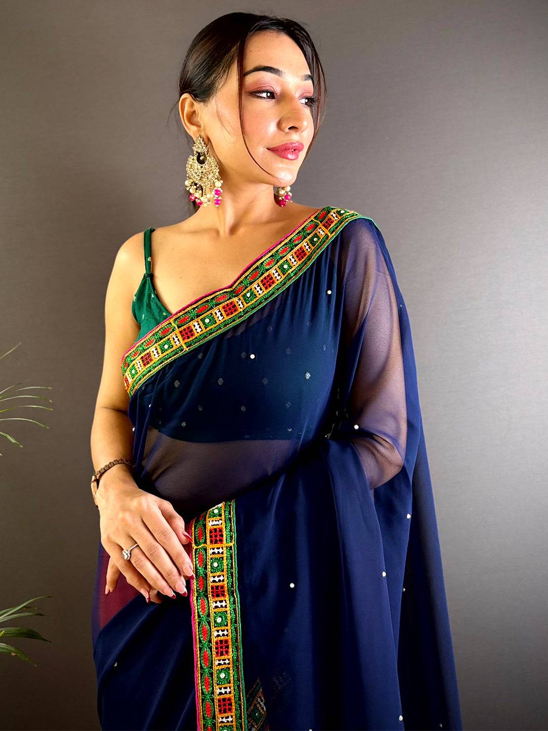 Orange Georgette Saree With Exquisite Katchi Work