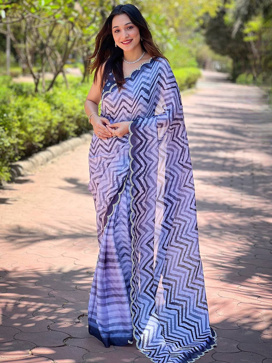 Beautiful Leheriya And Striped Print Saree
