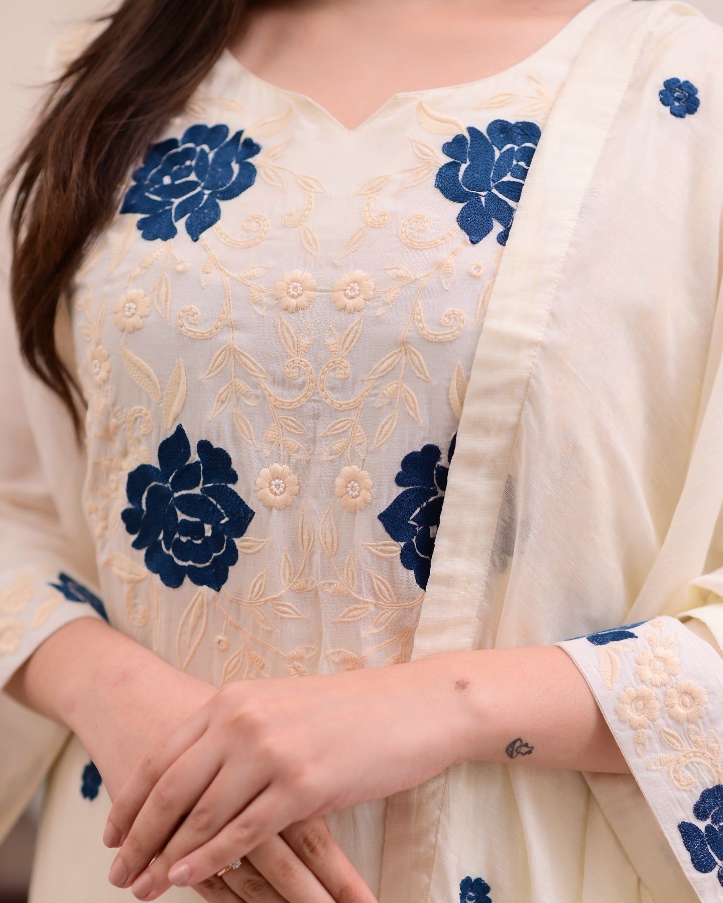 Graceful White Kurta Set with Blue Floral Accents