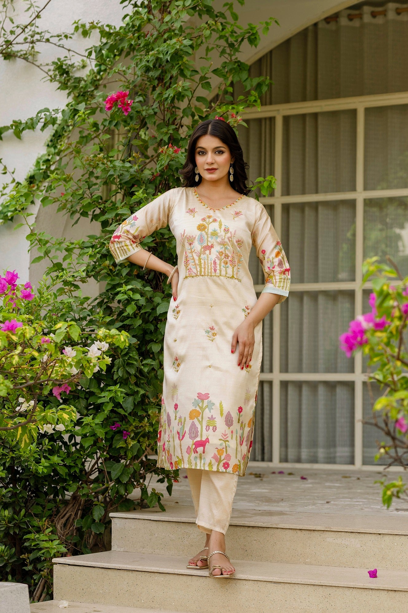 Pearl Elegance: Traditional Cream Ensemble with Sophisticated Flair