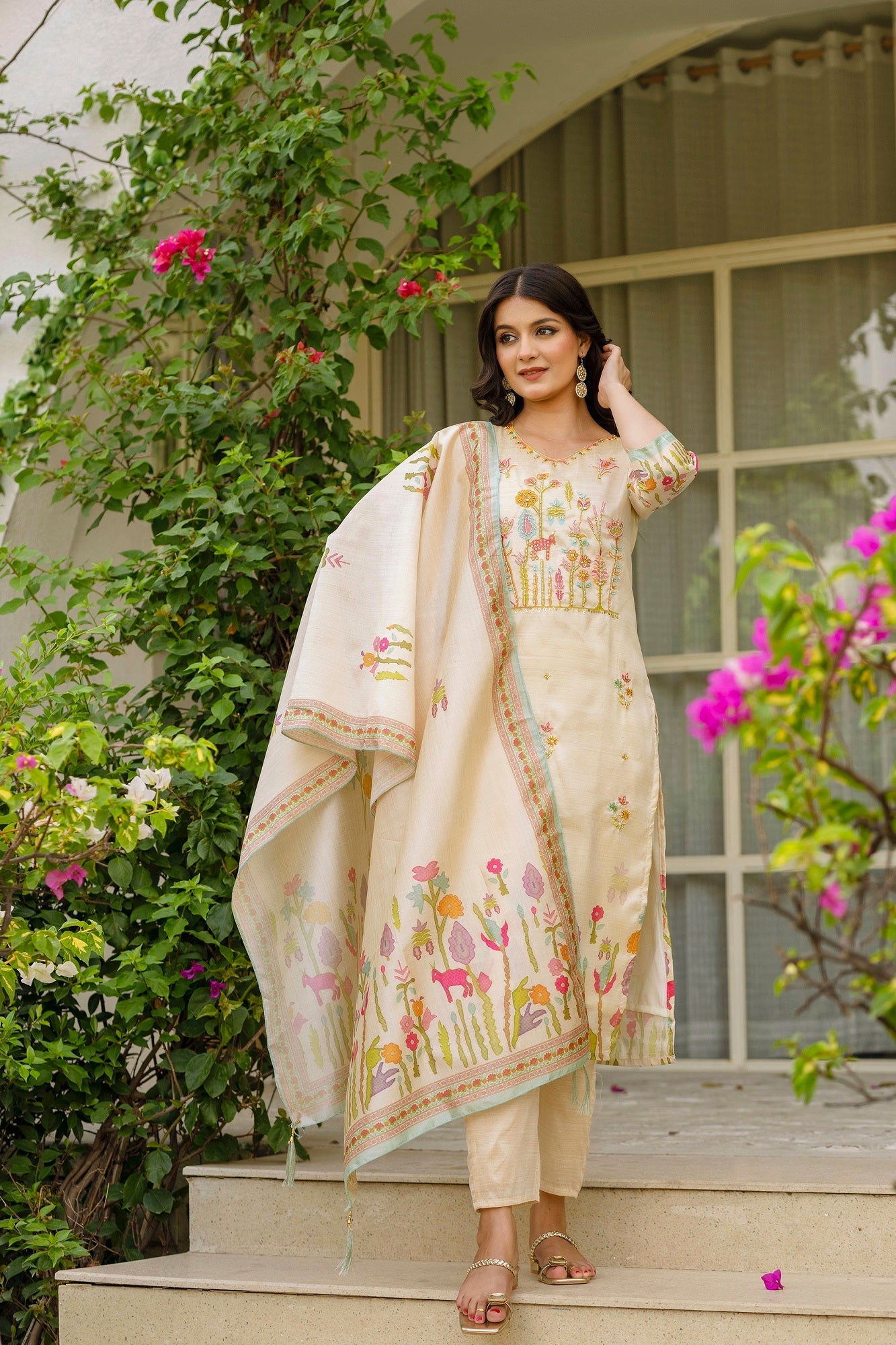Pearl Elegance: Traditional Cream Ensemble with Sophisticated Flair