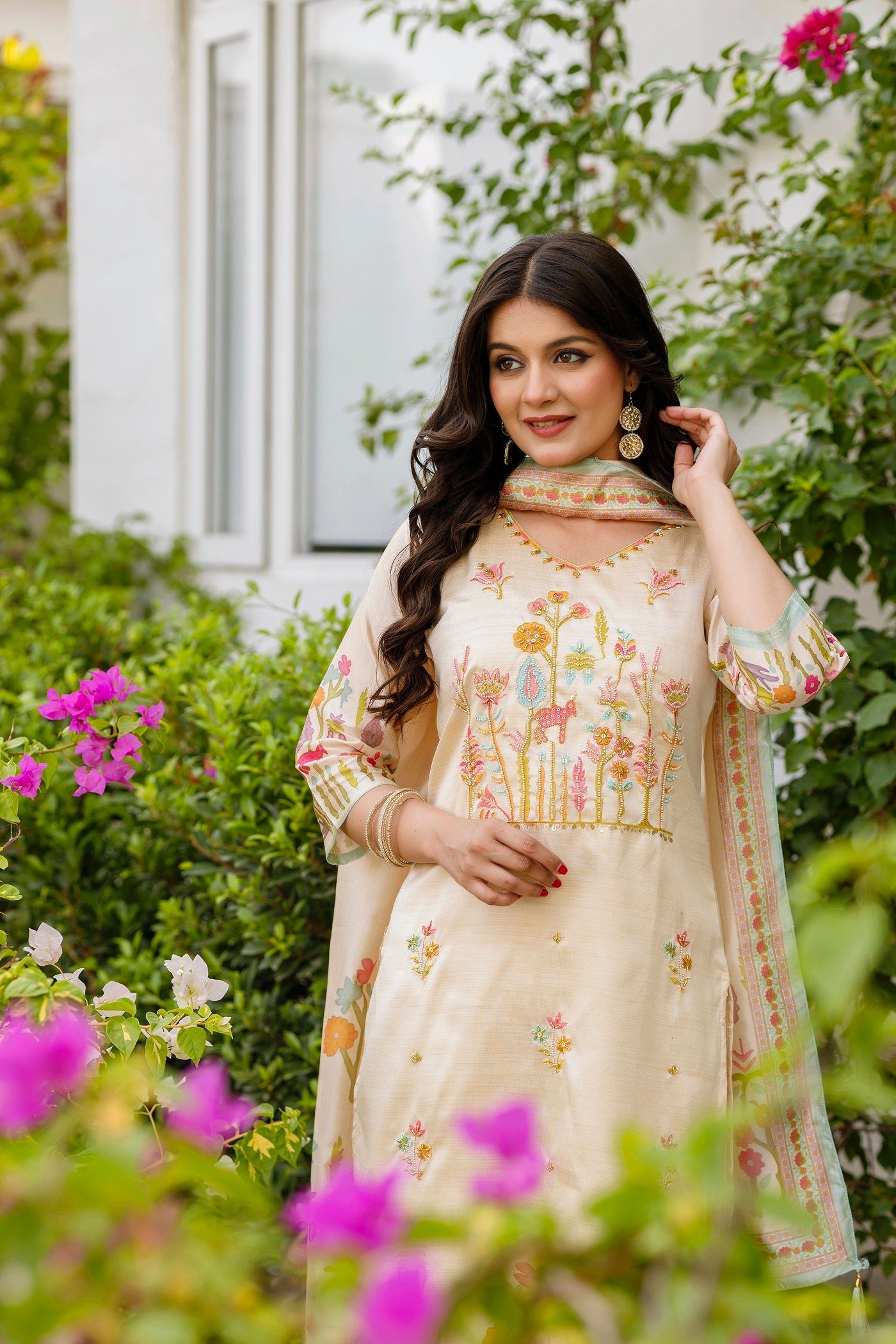 Pearl Elegance: Traditional Cream Ensemble with Sophisticated Flair