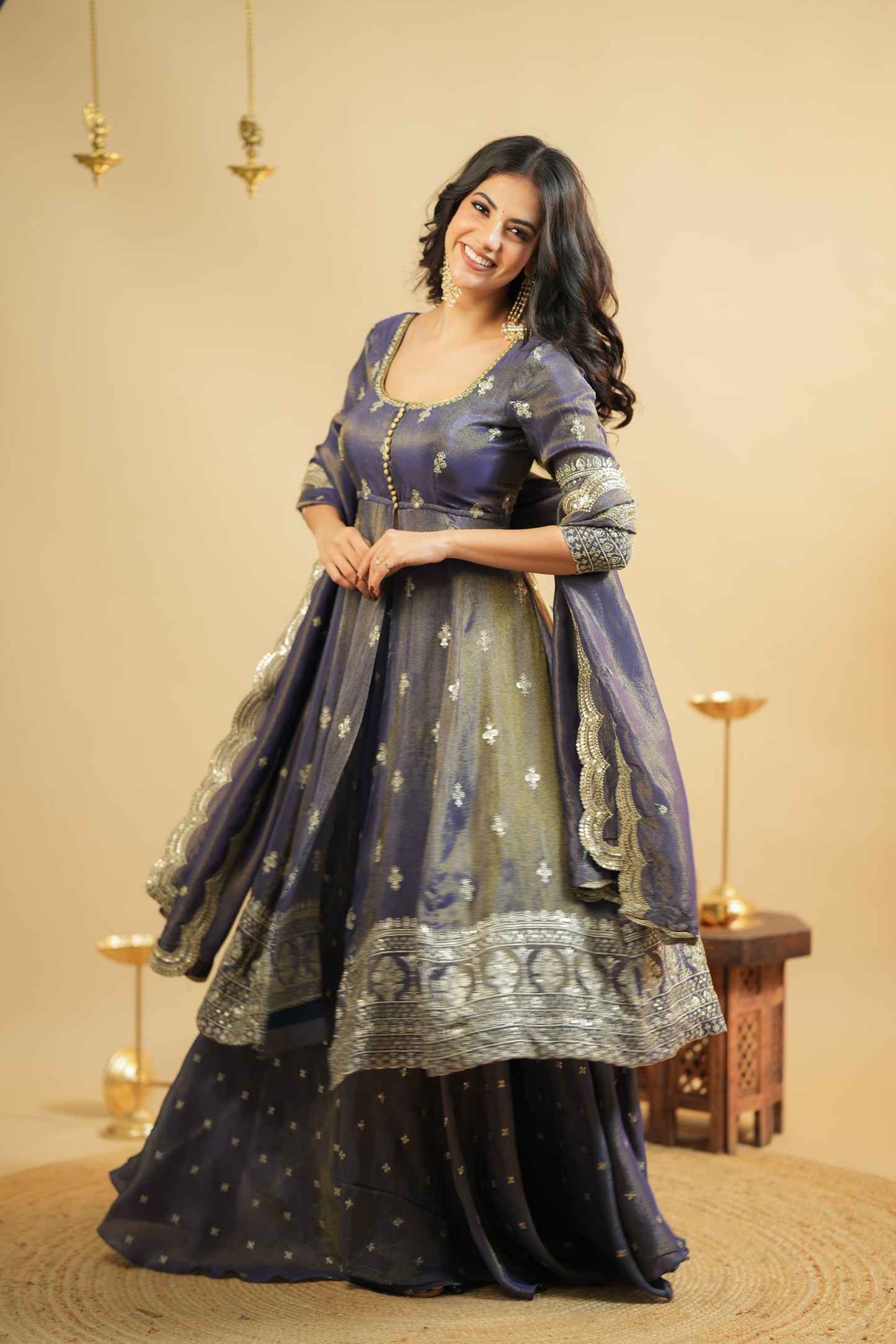 Woman wearing a traditional outfit with a beige background