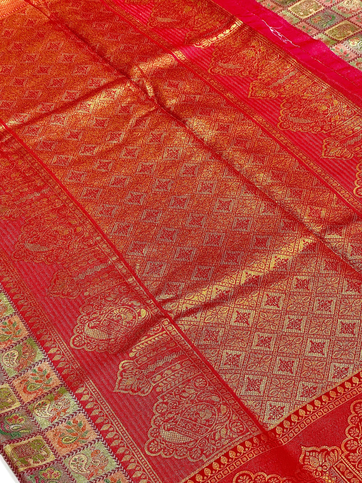 Pink Animal Motif Saree With Gold Zari Border by My Store