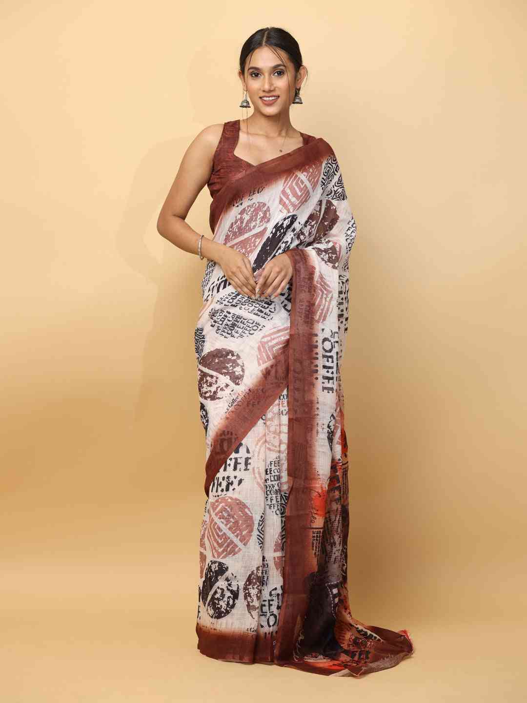 News Paper Trendy Print Soft Linen Party Wear Saree by My Store