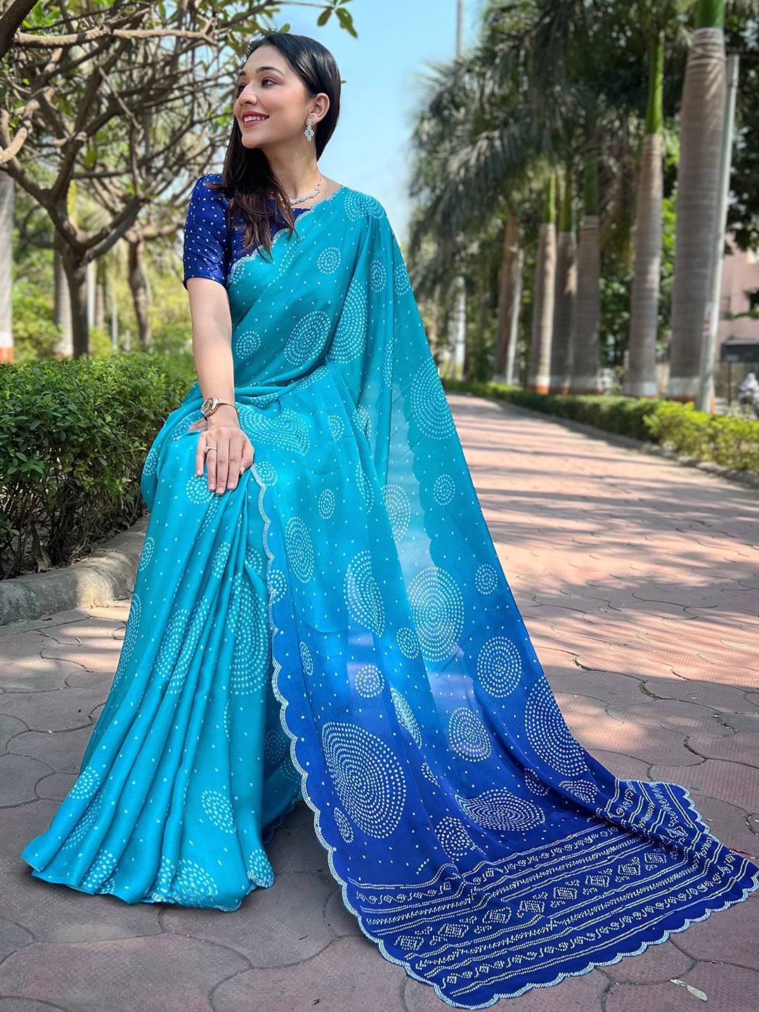 Turquoise Georgette Silk Saree with Ombre Bandhej Print & Swaroski Stone Work