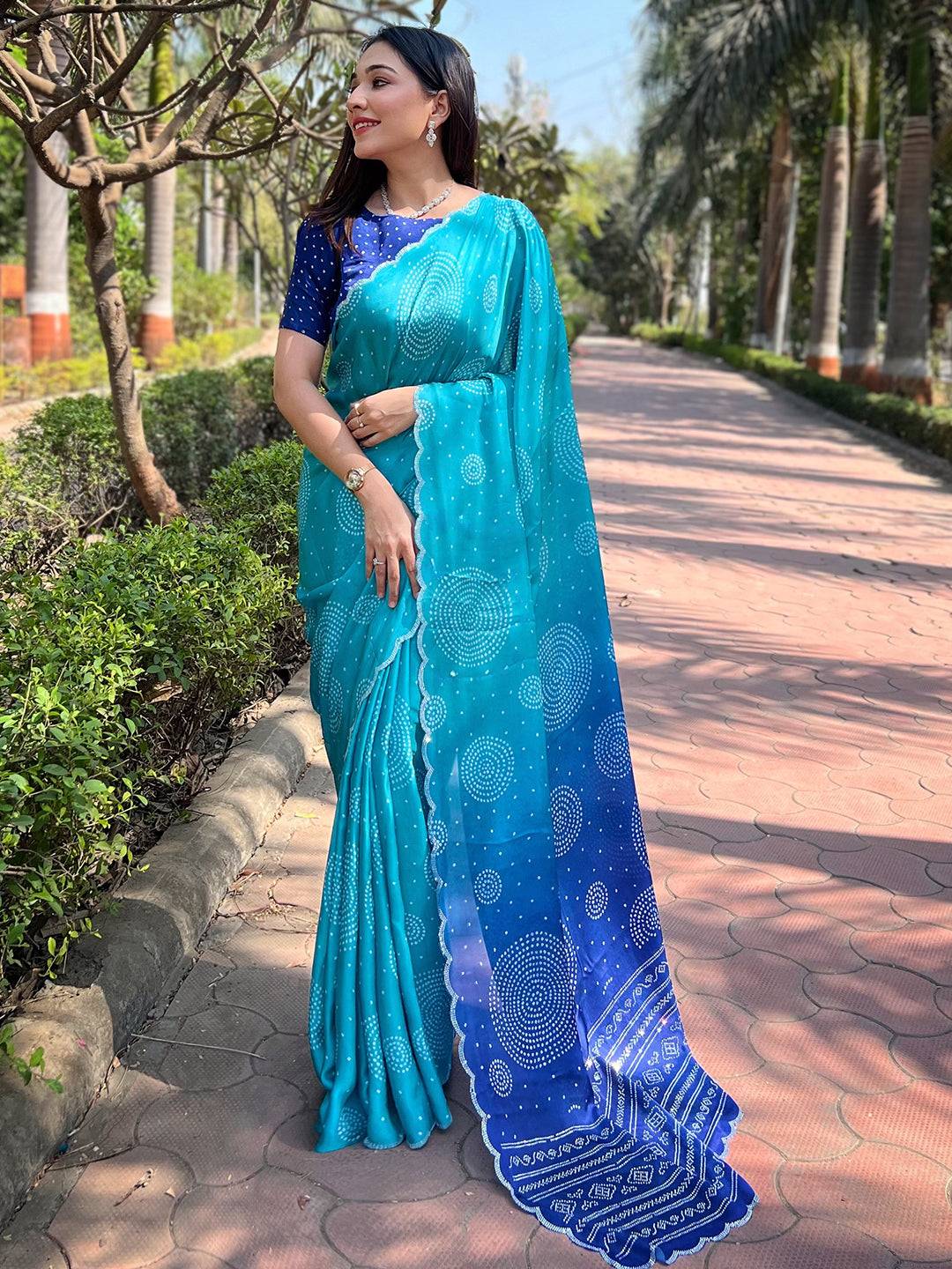 Turquoise Georgette Silk Saree with Ombre Bandhej Print & Swaroski Stone Work